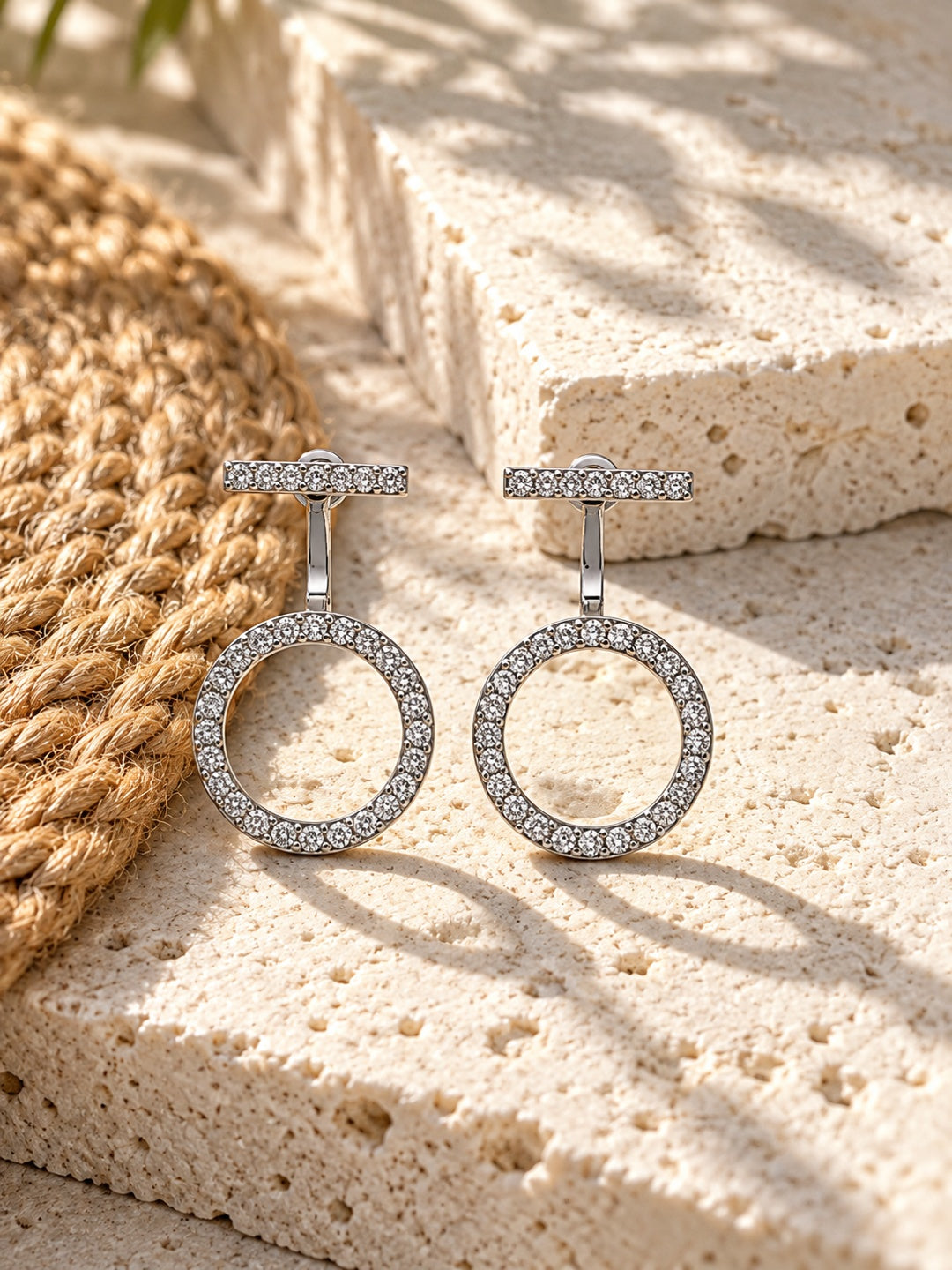 Niska AD Stone Silver replica circular drop earrings worn by model