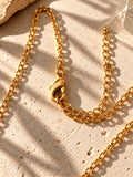 Niska Golden Bee Pendant Necklace detail view