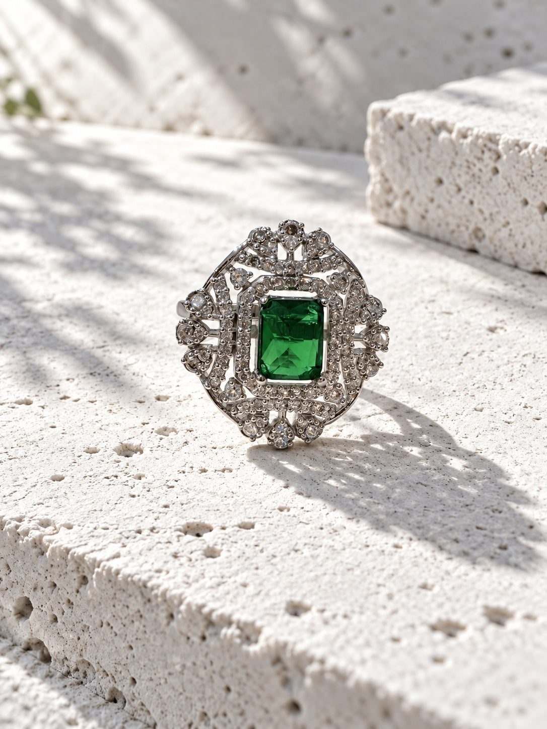 Niska green AD stone statement ring RI26N10453 on model in light brown dress