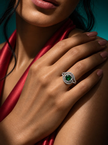 Niska green oval AD stone swirl ring in silver tone worn on model hand