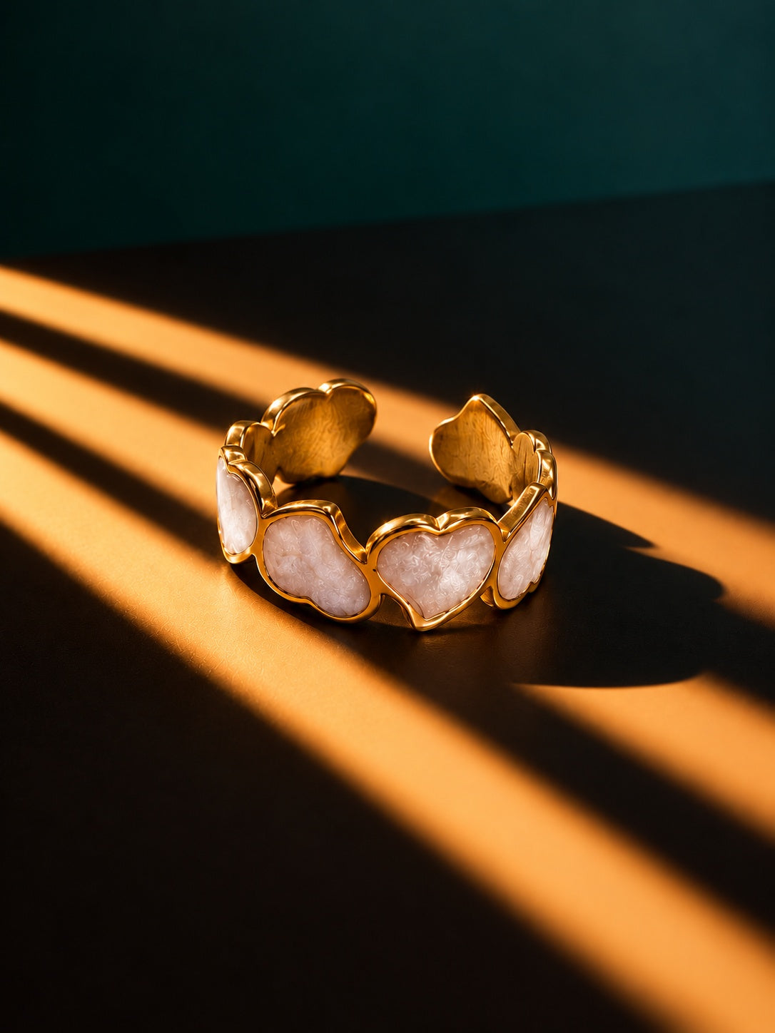 Niska gold-tone pearlescent heart ring detail
